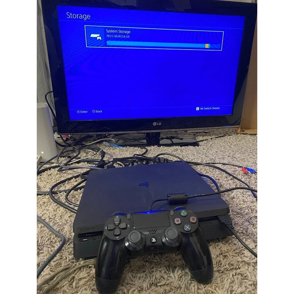 PlayStation 4 Slim 1TB System (PS4 Slim) [Controller And Cords Included] CLEAN